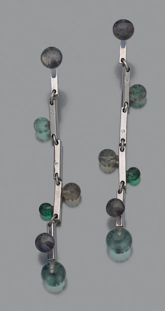 null Long pair of articulated EARPENDANTS in white gold (750‰) adorned with various...