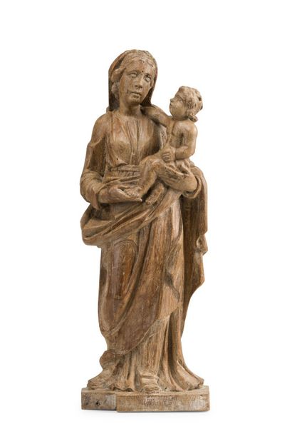 null Vierge à l'Enfant en noyer sculpté en ronde-bosse, base monoxyle.

XVIIe siècle

H....