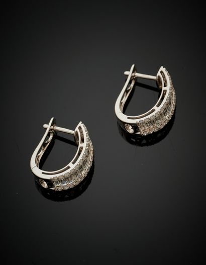 null Pair of white gold (750‰) EARRINGS set with alignments of brilliant-cut and...