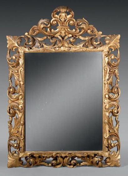 Grand miroir baroque à encadrement de bois...