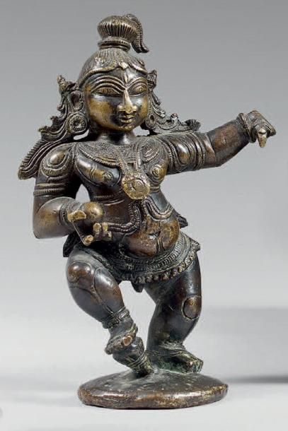 INDE - XVIIe-XVIIIe siècle Statuette de Krishna enfant dansant en bronze à patine...