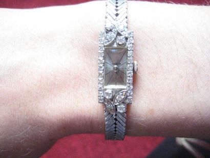 null Montre-bracelet de dame, en or gris 18K, la montre de forme rectangulaire, le...