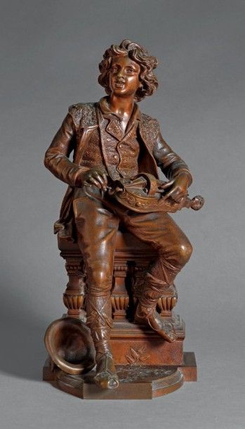 MARCEL DEBUT (1865-1933) Le joueur de vielle Épreuve en bronze à patine brune, signée....