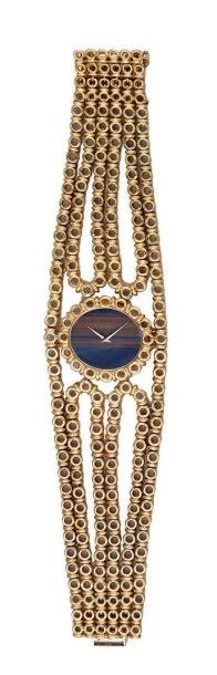 null Montre bracelet de dame en or jaune 18k (750) formée de six chaînettes encadrant...