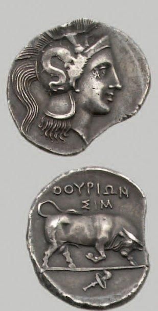null Distatère. 14,96 g. Tête d'Athéna à d., coiffée du casque athénien orné d'un...