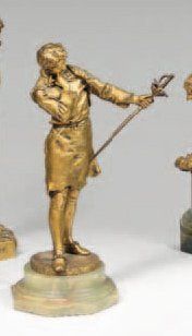Henryk KOSSOWSKI (1815-1870) Le forgeron à l'épée Bronze à patine dorée. Signé sur...