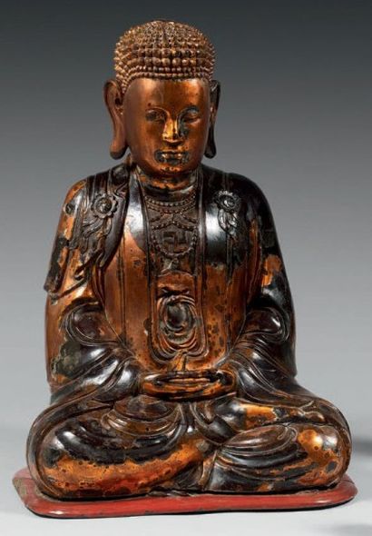 VIETNAM, XIXe siècle Bouddha en bois laqué or assis en padmasana, les mains en dhyana...