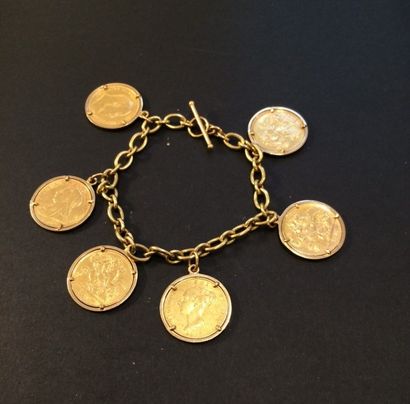 null Bracelet en or jaune (750 millièmes) à maillons ovales retenant six pièces en...