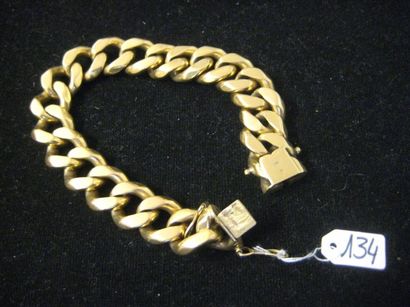 null Bracelet en or jaune 18 ct (750) à maille gourmette.
(Usure).
Long. 23,3 cm...