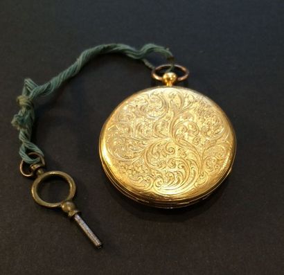 null Petite montre de poche en or jaune (750 millièmes) finement guilloché et ciselé...