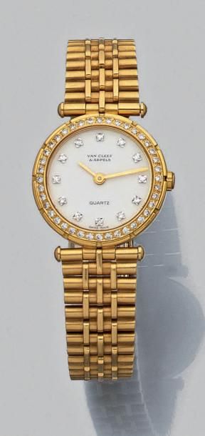 null Montre bracelet de dame à quartz en or jaune 18K (750) à boîtier rond, le tour...