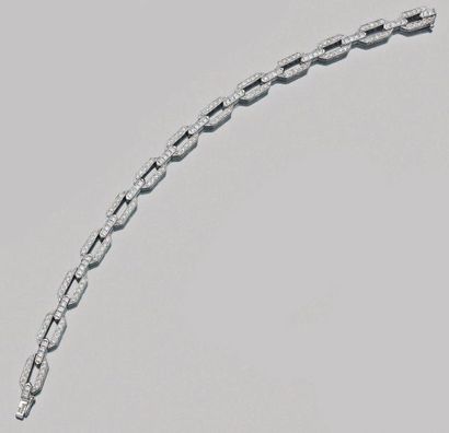 Bracelet articulé en or gris (750 millièmes)...