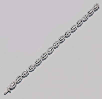 null Bracelet articulé en or gris (750 millièmes) ajouré, à motifs violonnés serti...