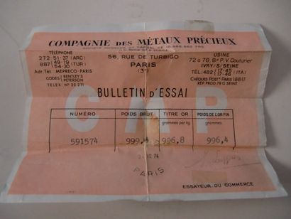 null Lingot or avec son bulletin d’essai de la "Compagnie des Métaux Précieux"
N°...