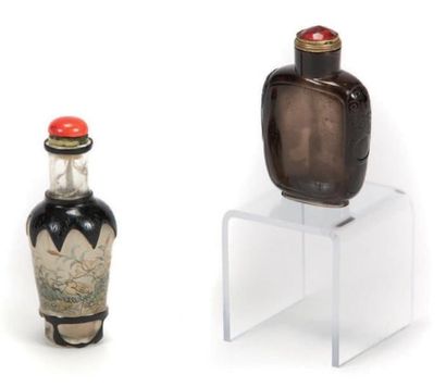 CHINE - XIXe-XXe siècle Deux flacons tabatière l'un rectangulaire en cristal de roche...