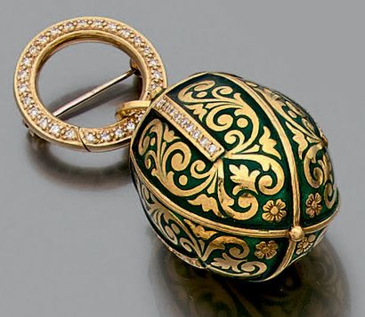 null Broche «à secret» en or jaune (585 millièmes) 14 carats, composé d'un anneau...
