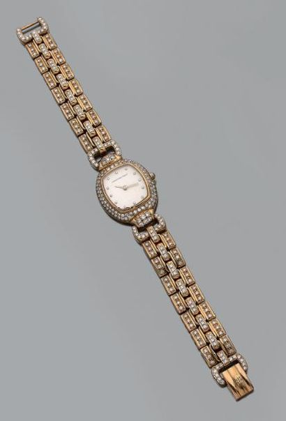 null Montre bracelet de dame à quartz en or jaune 18K (750) à boîtier tonneau le...