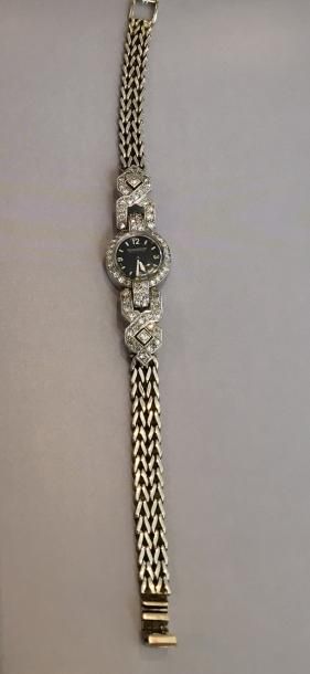 JAEGER LECOULTRE Bracelet montre de dame ronde en platine (950 millièmes) et or gris...