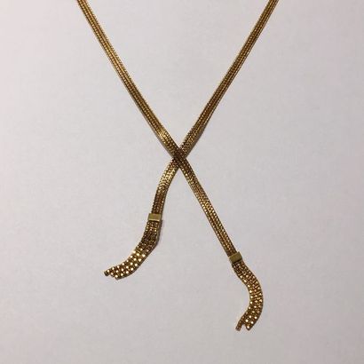 null COLLIER «croisé» à floches en or jaune (750 millièmes).
Longueur: 41 cm env.
Poids:...