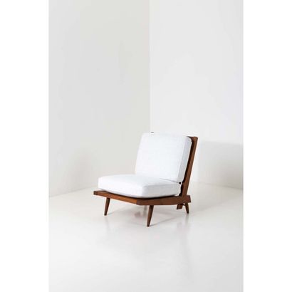  George Nakashima (1905-1990)
Cushion Lounge chair - Commande spéciale
Chauffeuse
Noyer... Gazette Drouot