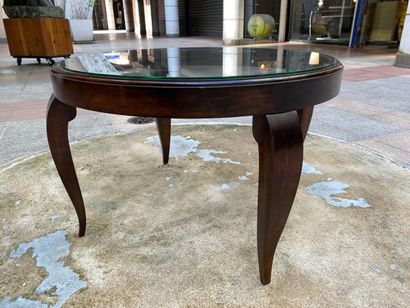 null Mahogany coffee table, glass top.

French work circa 1950.

Height : 50, diameter...