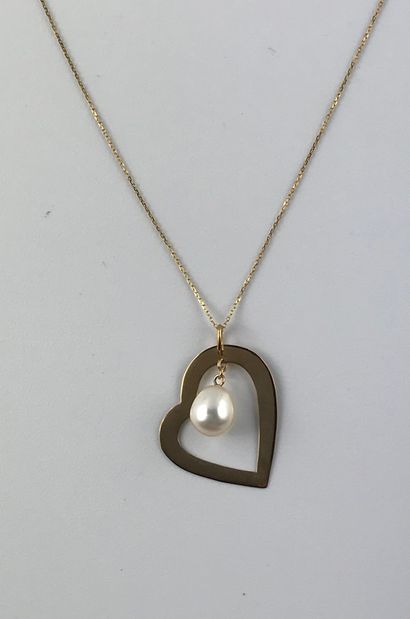 null Chain and its heart pendant in gold 375°/°° with a freshwater pearl in pendant,...