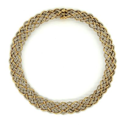 COLLIER deux ors à décor tressé NECKLACE two gold (750‰) with braided decoration....