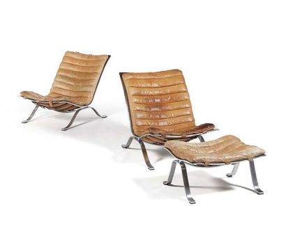 ARNE NORELL (1917-1971) 
Pair of armchairs called Ari and a footrest
Steel, leather
80...