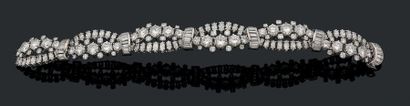 null BRACELET "DIAMONDS" Brilliant cut
diamonds, shuttle and baguette, platinum (850).
Circa...