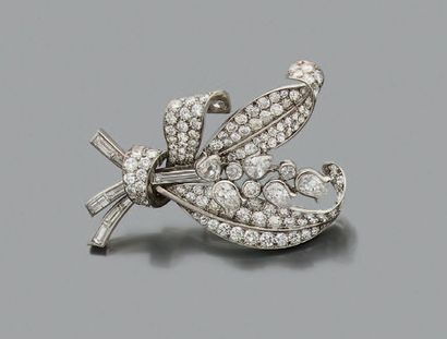 null CLIP "GERBE DE MUGUET" Round
diamonds, pears and baguettes, platinum (950) and...