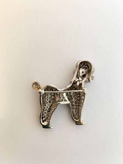 null BROCHE "CANICHE"
Diamants de taille huit -huit, rubis, platine (850) et or 18k...