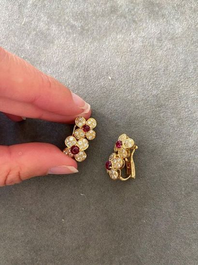 VAN CLEEF & ARPELS Pair of "Cosmos" flower earrings.
Diamonds, rubies, 18k gold (750)....