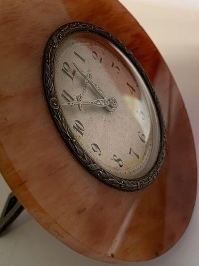 TIFFANY & CO Round table clock. Agate (?), silvered guilloché dial with Arabic numerals,...