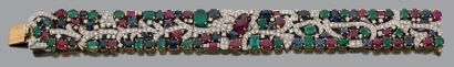 null BRACELET "TUTTI FRUTI"
Emeralds, rubies, sapphires, 18k gold (750).
L.: 17.5...
