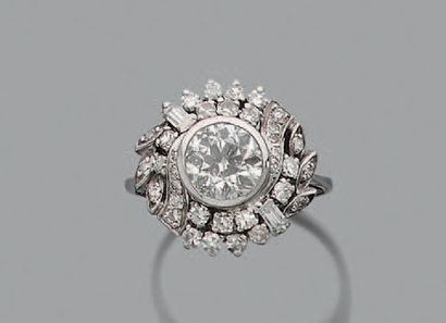 null RING "DIAMONDS"
Antique cut diamond, round diamonds and baguettes, 18k (750)...