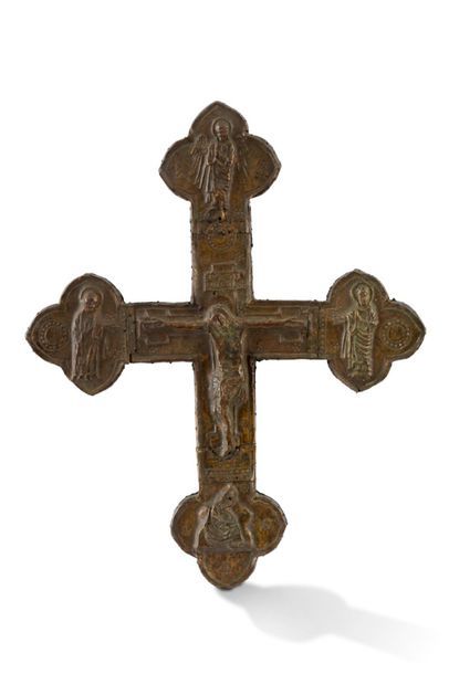 null PROCESSIONAL CROSS with wooden core covered with embossed and gilded copper...