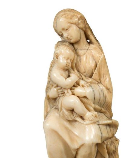 Attribué à Ehrgott Bernhard Bendl 
CHILD'S VIRGIN in ivory carved in the round. Seated,...