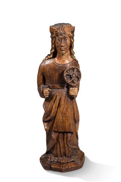 null SAINTE CATHERINE en bois sculpté avec traces de polychromie XVIe siècle
H. 83...