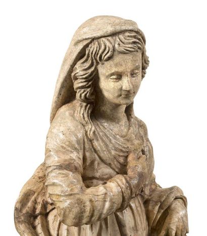 null ANNOUNCEMENT VIRGIN in carved alabaster. Standing, tilting her head slightly,...