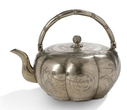 VIETNAM Teapot in silvery metal in the shape of a pumpkin, with handles imitating...