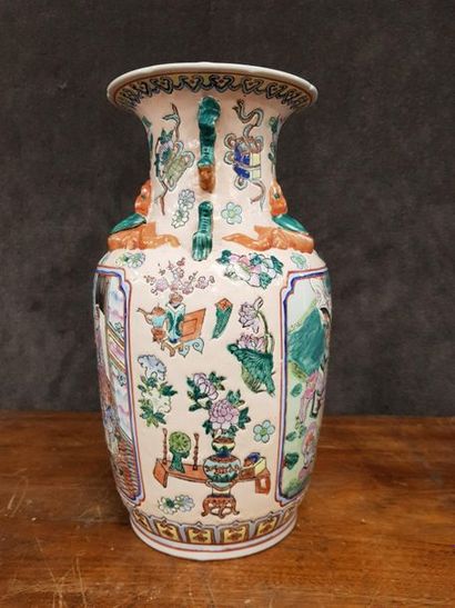null China, circa 1970

Canton porcelain vase with scenes of characters, movable...