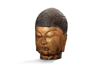 null China, in the style of northern Qi, 20th century

Head of Buddha in limestone,...