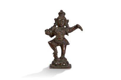 null India, 18th century

Bronze statue of brown patina, representing Vishnu dancing,...