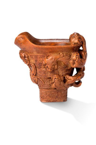 null China, early 20th century

Bamboo libatory cup carved with five lions on the...