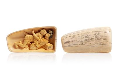 null China, circa 1930-1940

Oblong ivory box, opening on a carved decoration in...