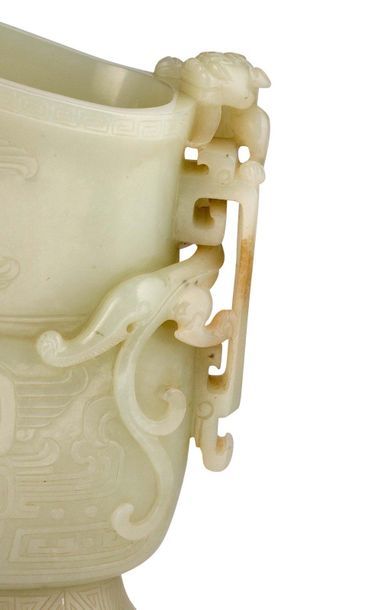 CHINE Celadon jade libation cup, with archaic dragon decoration on the lower part,...