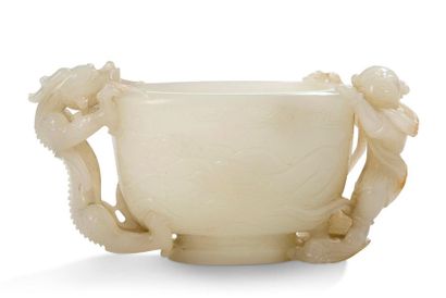 CHINE Libatory cup on pedestal, oval-shaped, made of white jade slightly infused...
