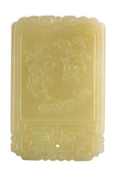 CHINE Rectangular pendant made of white celadon jade, carved in light relief of the...