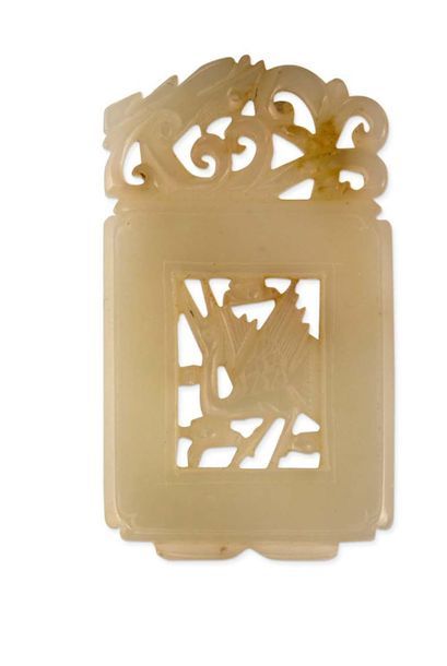 CHINE Celadon jade pendant, with finely carved and openwork decoration of a crane...