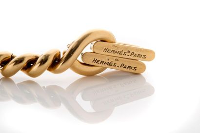HERMES Bracelet diamants et or jaune 18K (750). Signé Long.: 17.5 cm - Pb.: 84.8...